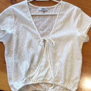 White crop with tie in the front